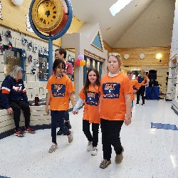 Students walking on the cool down lap